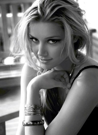 Amber Heard is the lovely young lady who is on the up and up